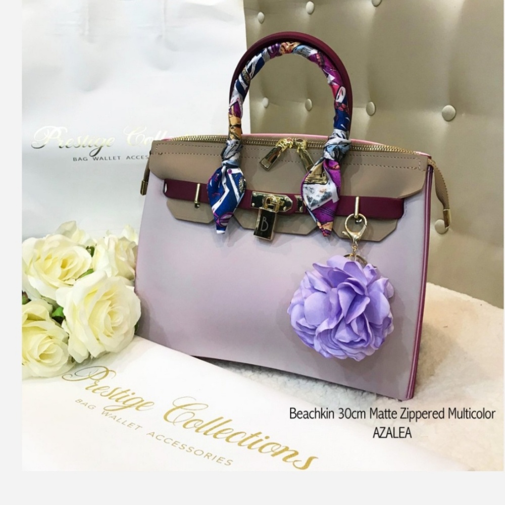 Handbag with detachable sling